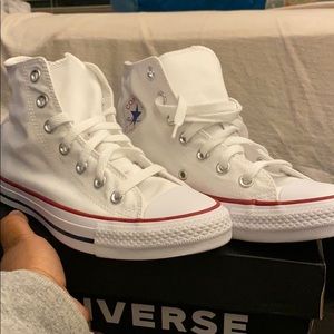 Never worn women’s Chuck Taylor All Stars High Top